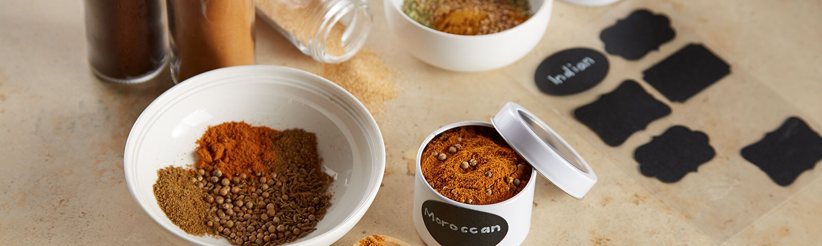 Different spices in white bowls on a table Different spices in white bowls on a table