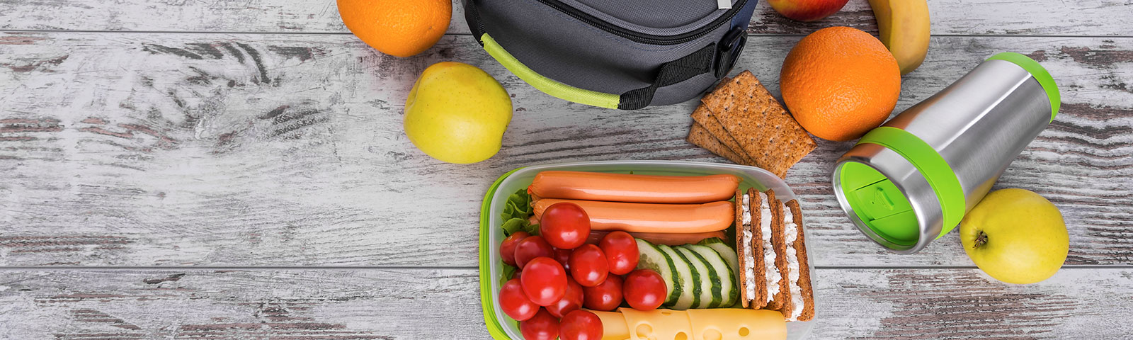 Packed lunch on a wooden table Packed lunch on a wooden table